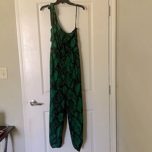 Green and black one shoulder romper, new with tags